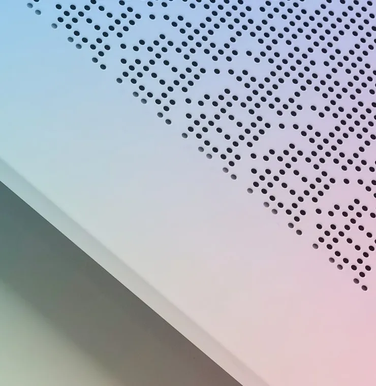 Perforated metal detail on a LOOP console panel