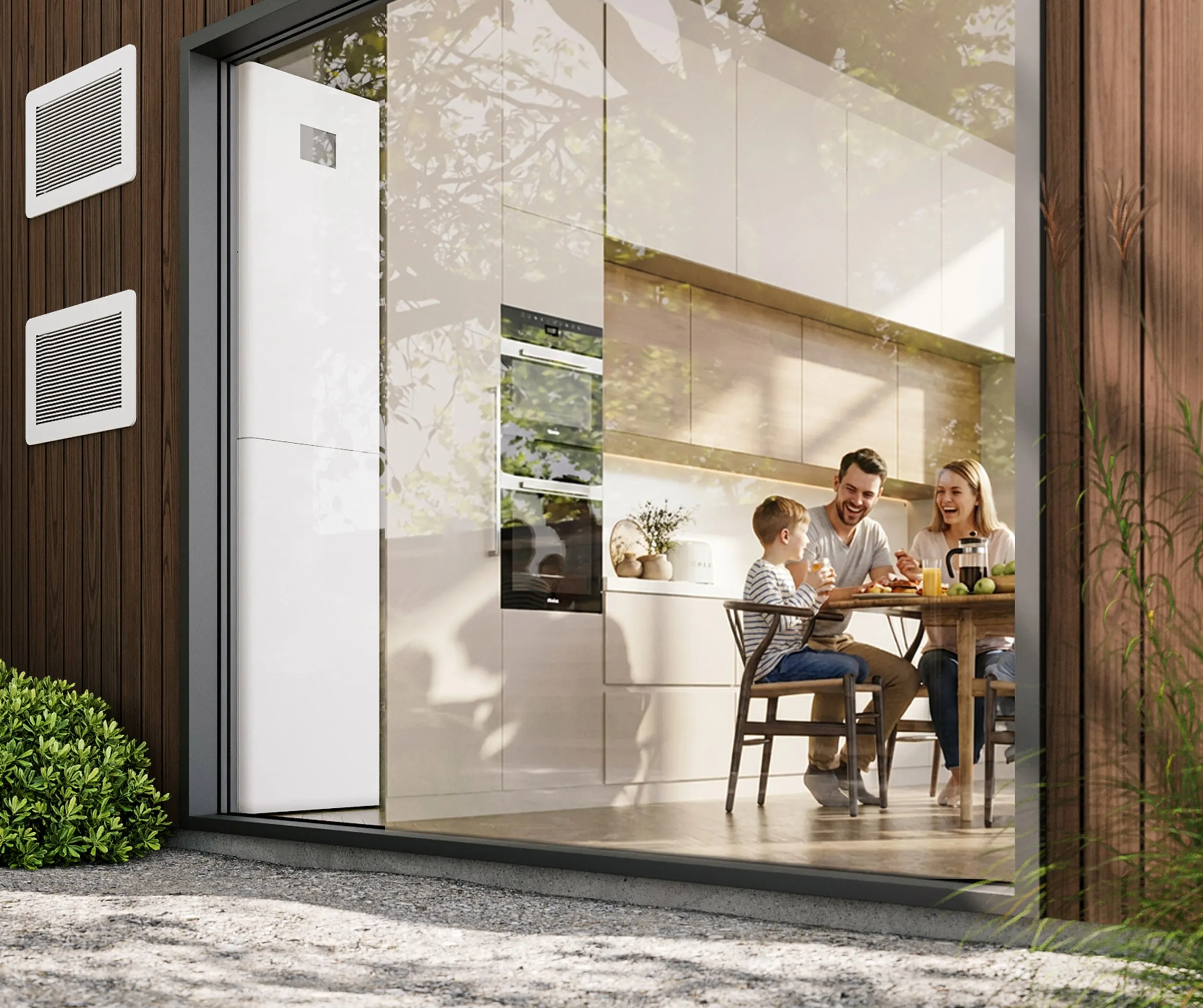 A family at dinner beside a STØNE unit in a wood-clad house