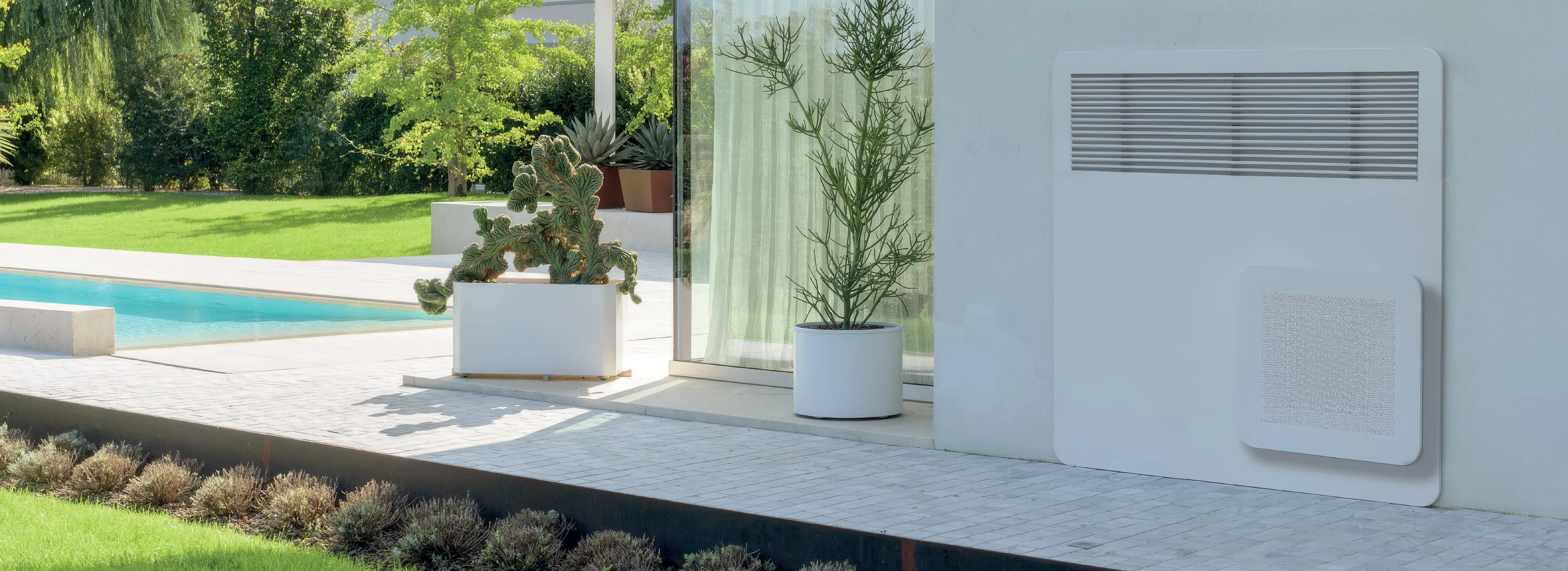 A STØNE unit on a poolside terrace wall