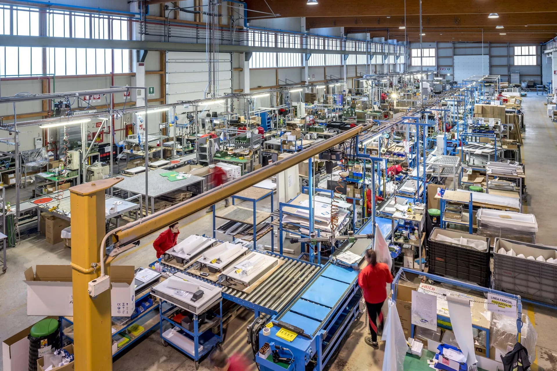 Coils and machinery on the factory floor