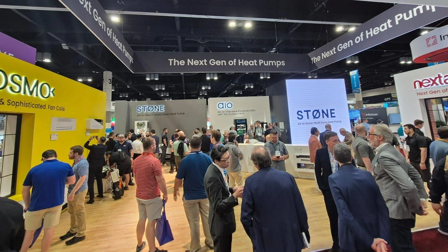The INNOVA booth crowd at a heat-pump trade show