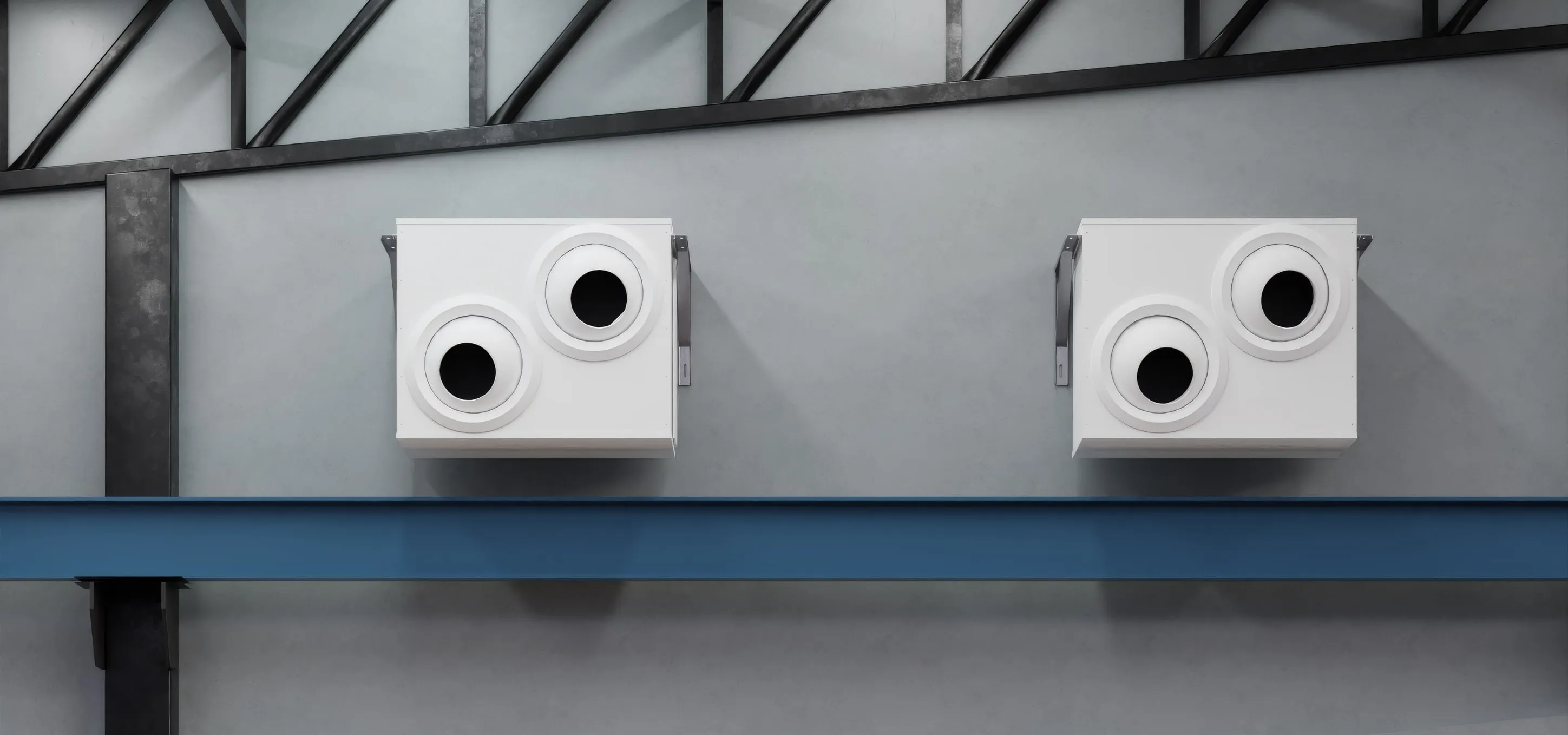 Two OKKI air jet units on an industrial wall above a steel beam